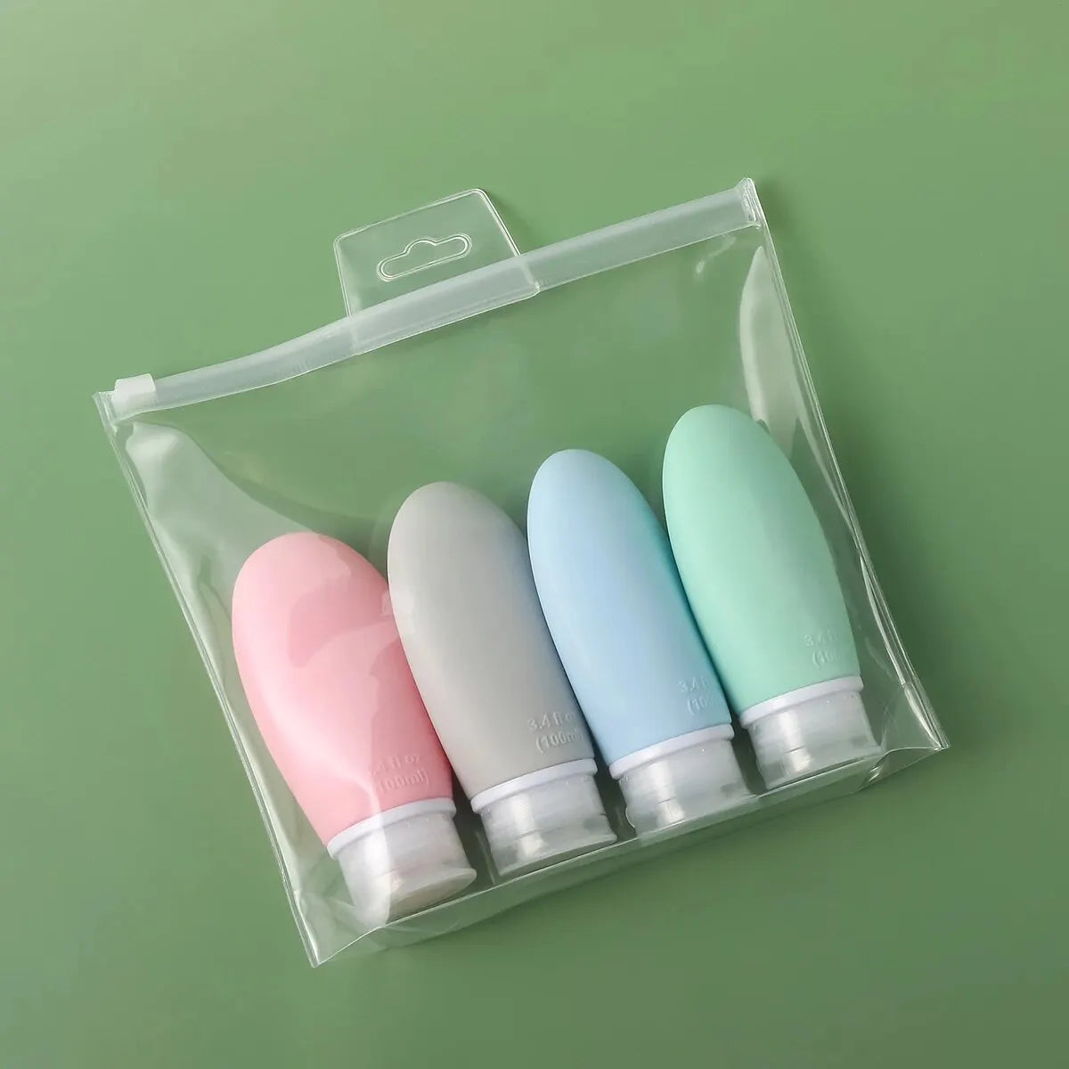 4-Piece Travel Size Silicone Squeeze Bottles Set - Leak-Proof Toiletries Kit for Shampoo, Conditioner, and Lotion